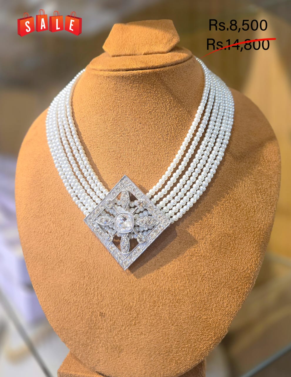 Multi-Strand Pearl Necklace With Pendant